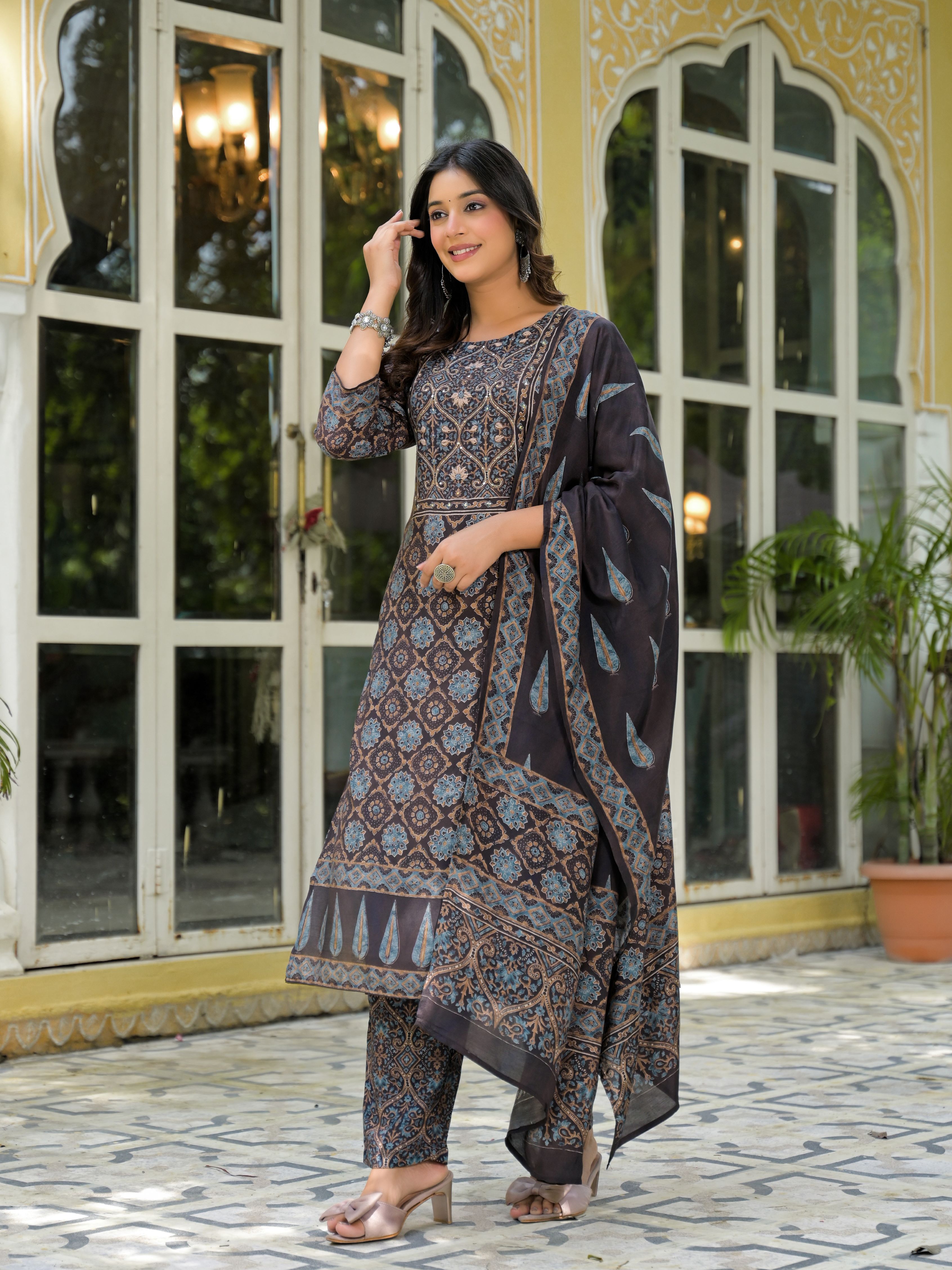 Ethnic Motifs Printed Round Neck Sequinned Muslin Kurta With Trousers & Dupatta Hover